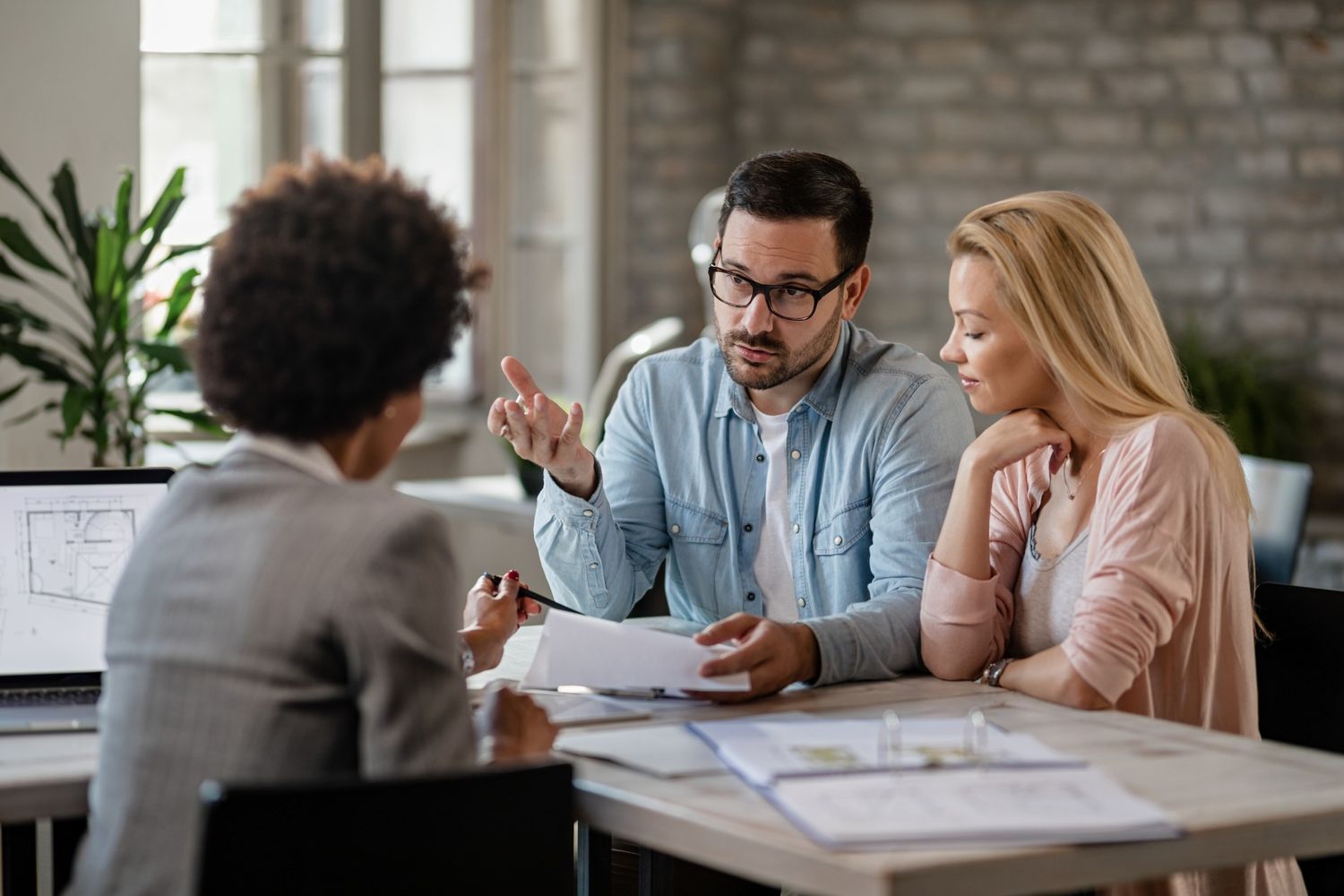Financial consultation with an advisor and a couple