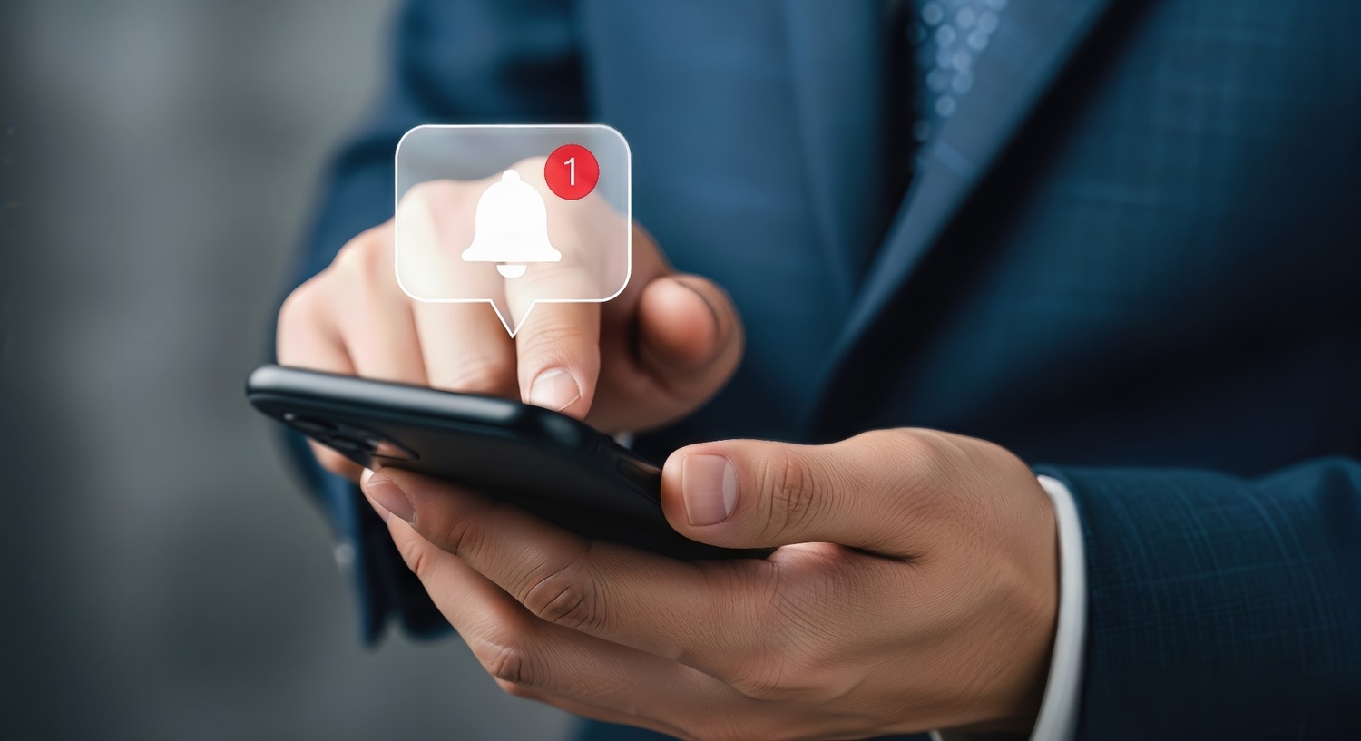 Man checking SMS alert on his phone